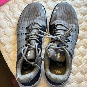 Under Armour Women’s basketball shoes, size 12 women, hardly worn.